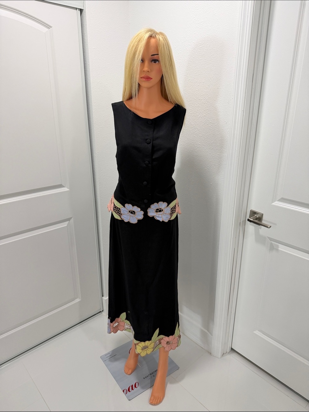 RIXO Black Sleeveless Midi Dress with Pastel Floral Appliqué